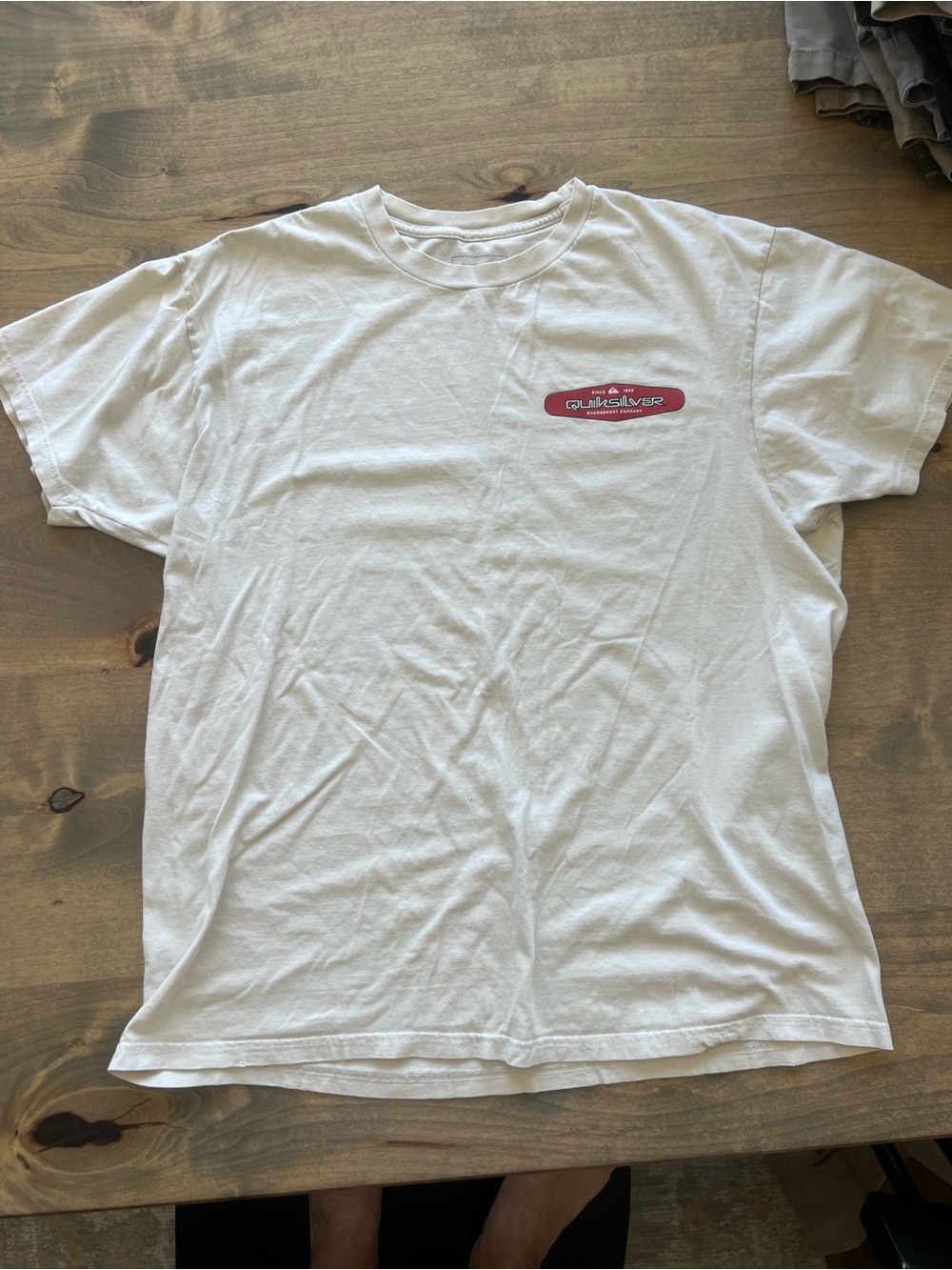 Quiksilver White Tee with Small Red Chest Logo